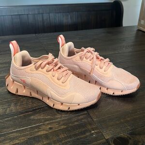 Peach colored Reebok’s size 9 I wore these maybe 5 times. Very comfortable!